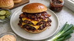 BBQ bacon smash burger recipe with crispy edges and bacon-onion BBQ sauce